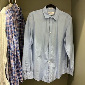 Blue Calvin Klein dress shirt.